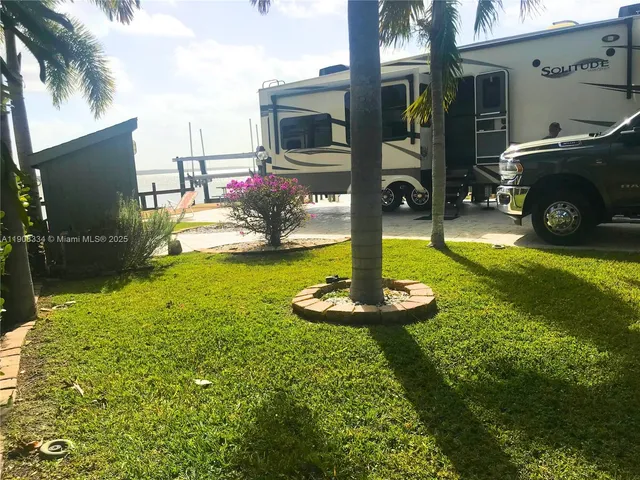 a view of wooden floor with a sink