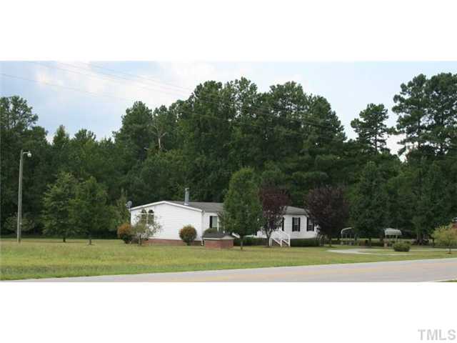 4053 Fairport Road Kittrell, NC 27544 - Photo 15 of 15 Wonderful level lot, brick well house, outdoor light, asphalt driveways, fruit trees.....only needs a new owner.