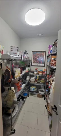 a view of a workspace with furniture