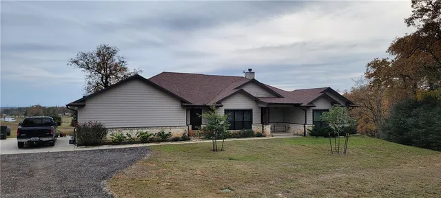 a house view with a garden space
