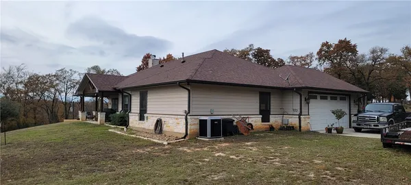 a house view with a garden space