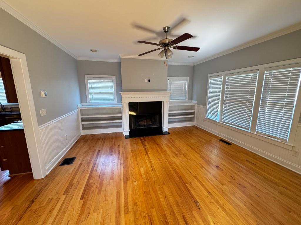 1713 Townside Drive Bishop, GA 30621 - Photo 10 of 25 wooden floor fireplace and windows in an empty room