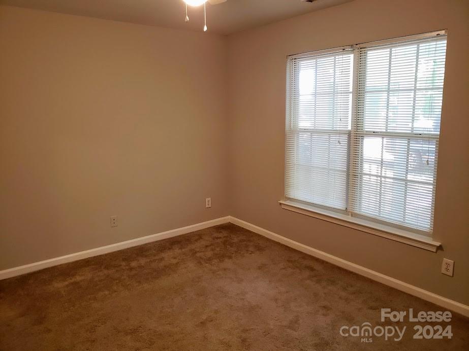 1207 Auten Road, Unit B Charlotte, NC 28216 - Photo 17 of 17 an empty room with a window