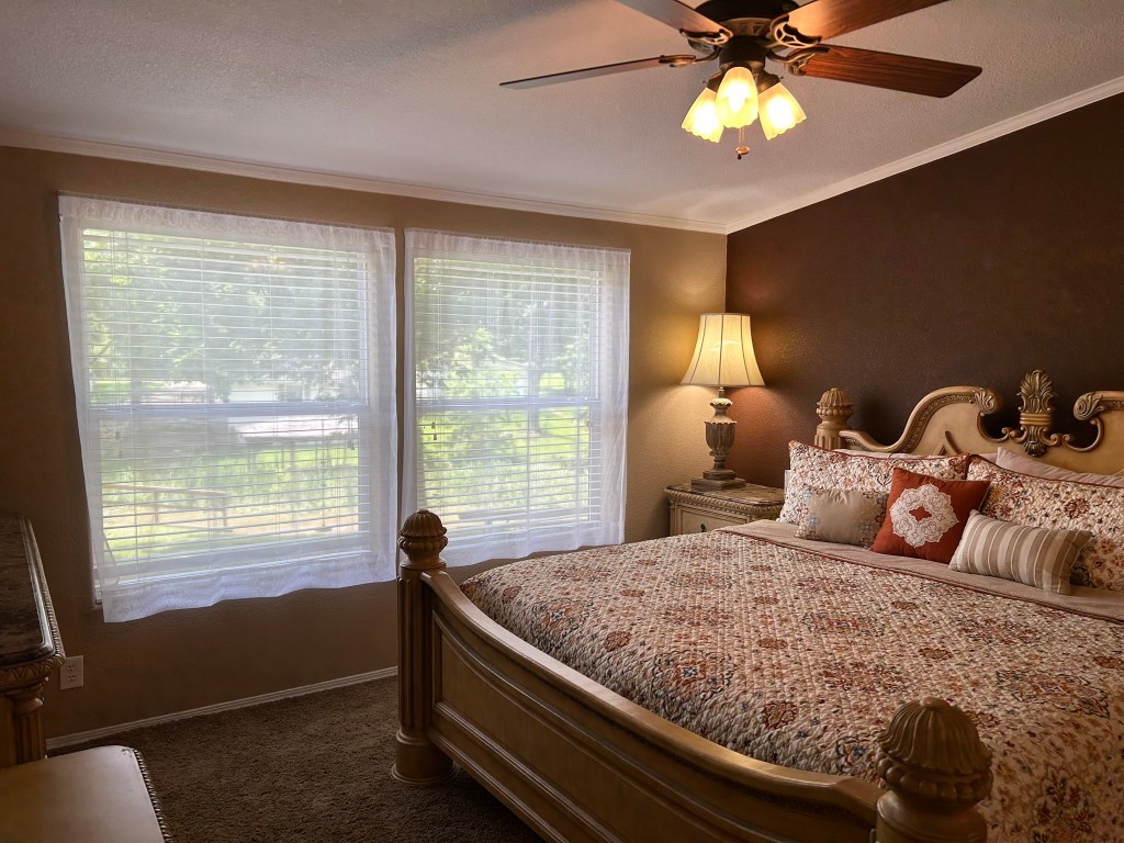 162 Cove View Drive Trinity, TX 75862 - Photo 14 of 50 a bedroom with a bed and a window