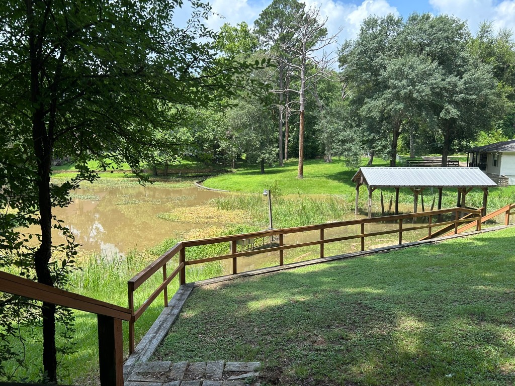 162 Cove View Drive Trinity, TX 75862 - Photo 37 of 50 a view of a bench in the garden