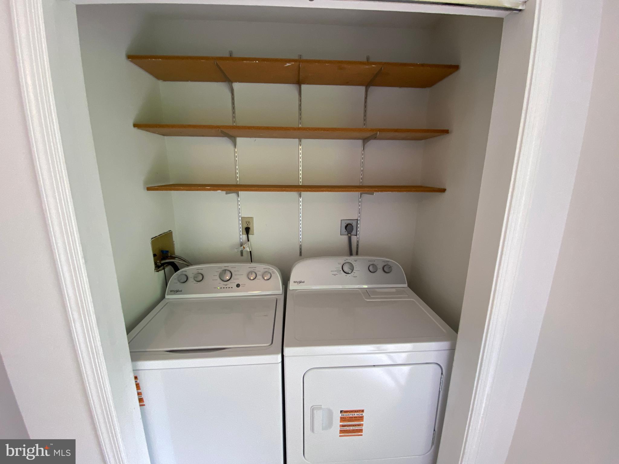 9298 Hayden Drive, Unit 14 King George, VA 22485 - Photo 7 of 17 a utility room with dryer and washer