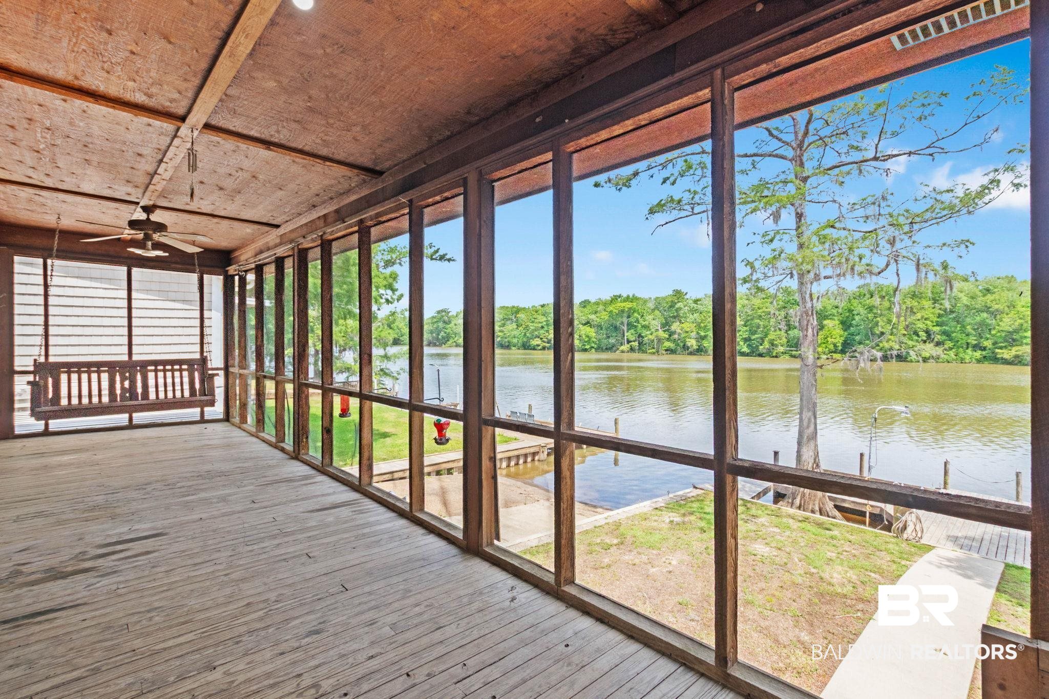 8153 Bryant's Lndg Road Stockton, AL 36579 - Photo 59 of 87 Spacious screened porch featuring wood-finish flooring and ceiling