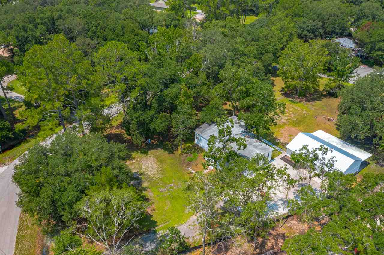 2360 Marlee Road South St. Johns, FL 32259 - Photo 14 of 22 a view of a lake with a yard