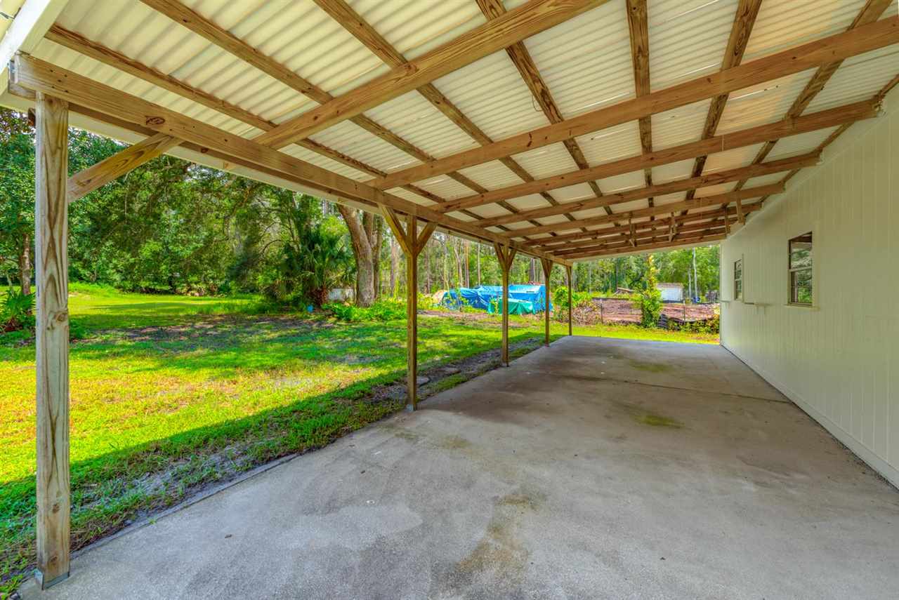 2360 Marlee Road South St. Johns, FL 32259 - Photo 7 of 22 a view of a porch with a yard
