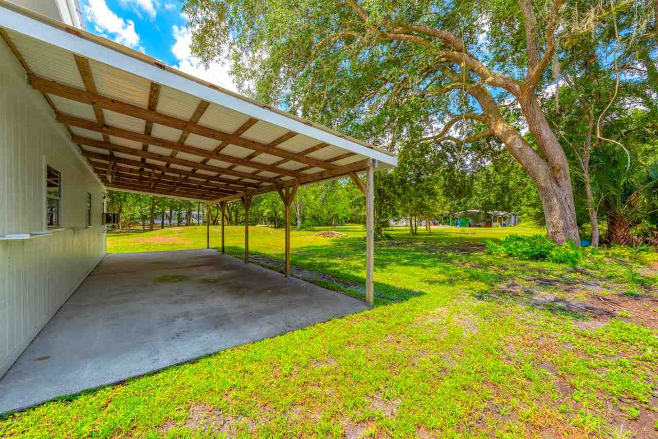 2360 Marlee Road South St. Johns, FL 32259 - Photo 8 of 22 a view of a backyard with swimming pool