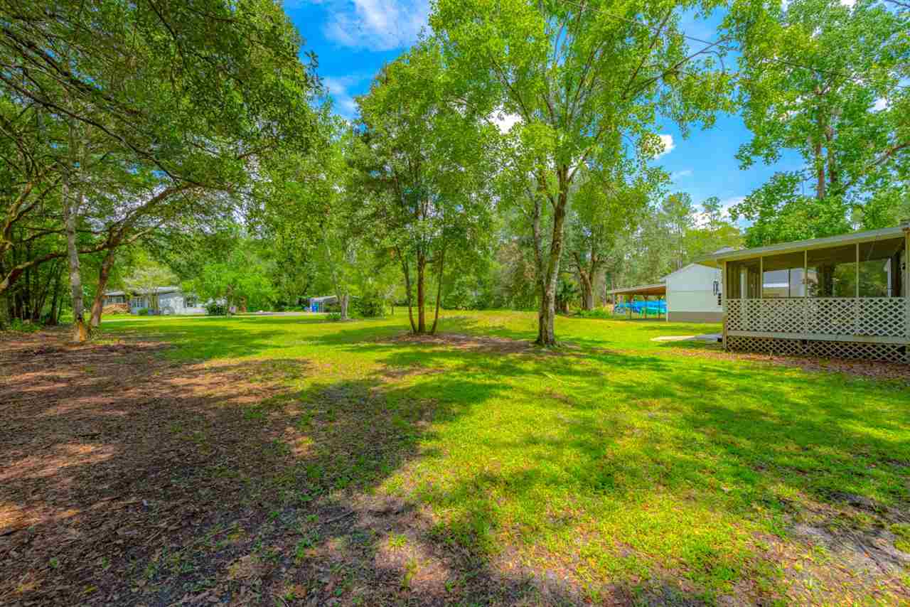 2360 Marlee Road South St. Johns, FL 32259 - Photo 9 of 22 a view of a house with a big yard