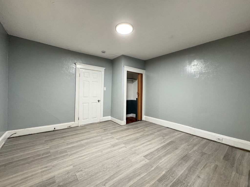 10 Faxon Road, Unit 1 Quincy, MA 02171 - Photo 5 of 11 a view of an empty room