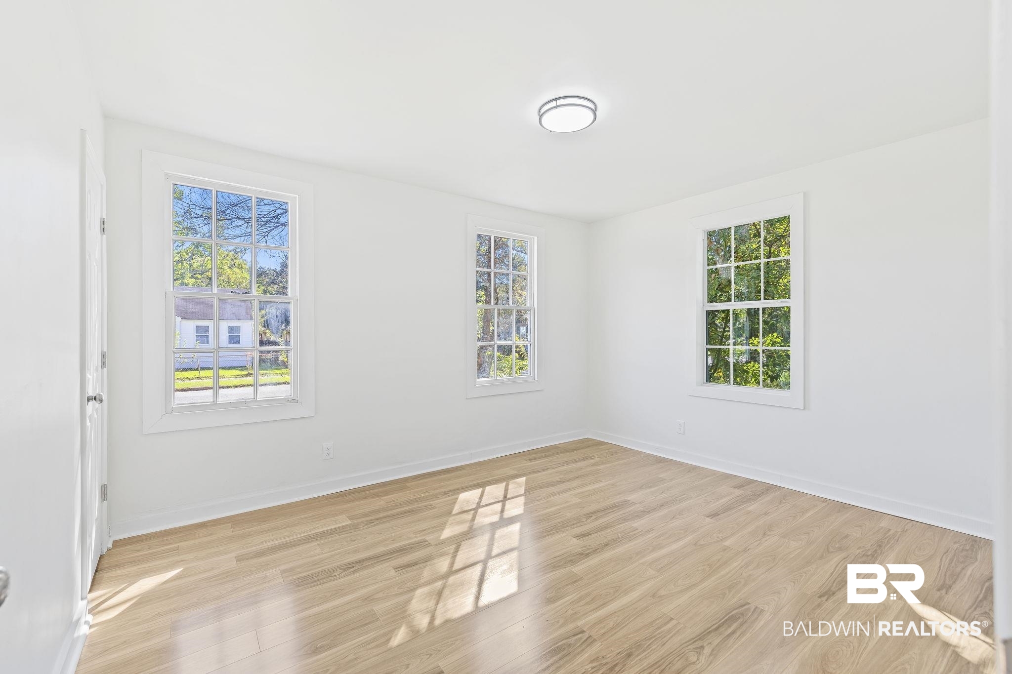 1400 North Cloverleaf Circle Mobile, AL 36605 - Photo 14 of 17 Spare room with light hardwood / wood-style floors