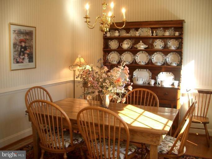 Excellent size Dining Room with hardwood floor.