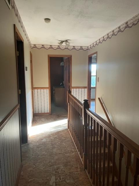 5807 West 122nd Place Crown Point, IN 46307 - Photo 18 of 24 a view of a hallway with wooden floor and staircase