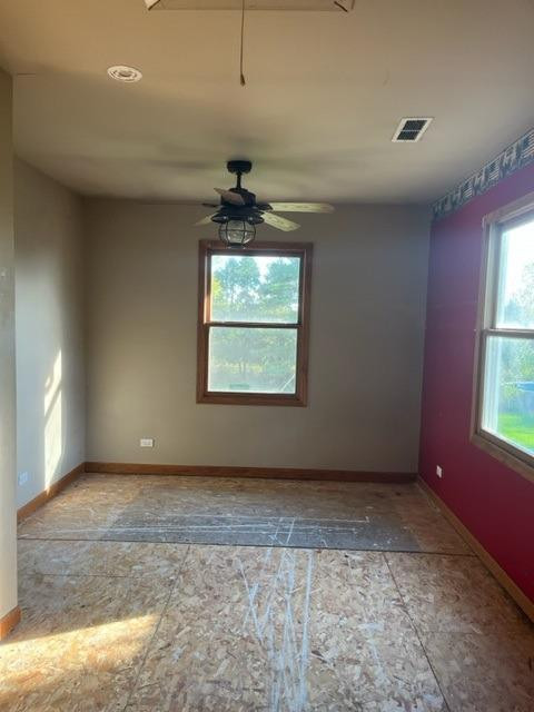 5807 West 122nd Place Crown Point, IN 46307 - Photo 8 of 24 a view of an empty room with a window