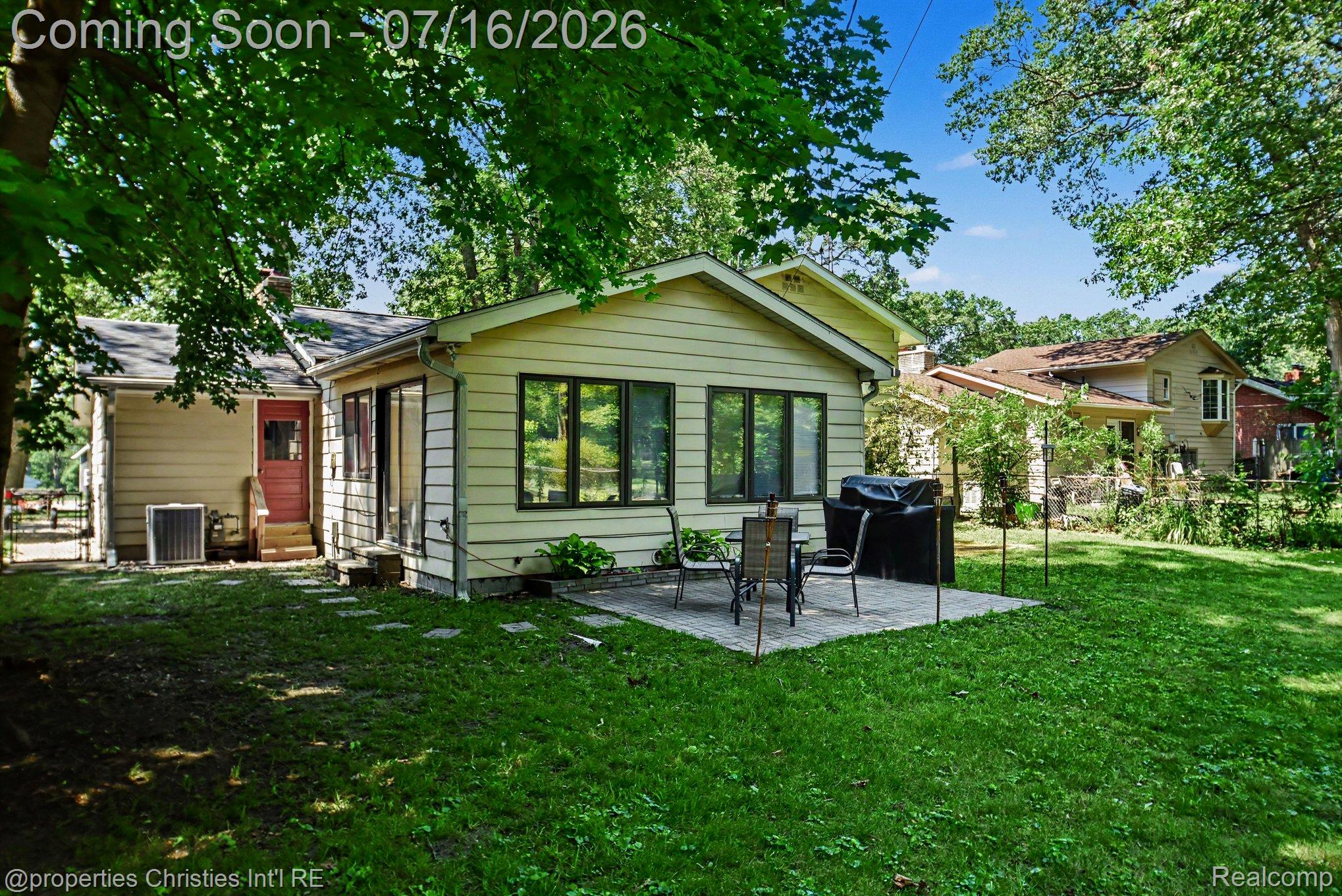 3304 Riverside Drive Port Huron, MI 48060 - Photo 25 of 26 Rear exterior with light-colored siding and multiple windows