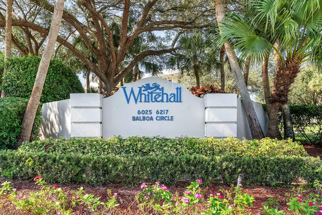 a sign on the side of the road