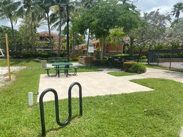 a garden view with a seating space