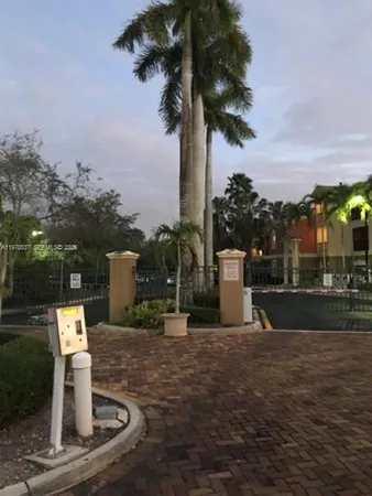 a view of a water fountain in front of the house