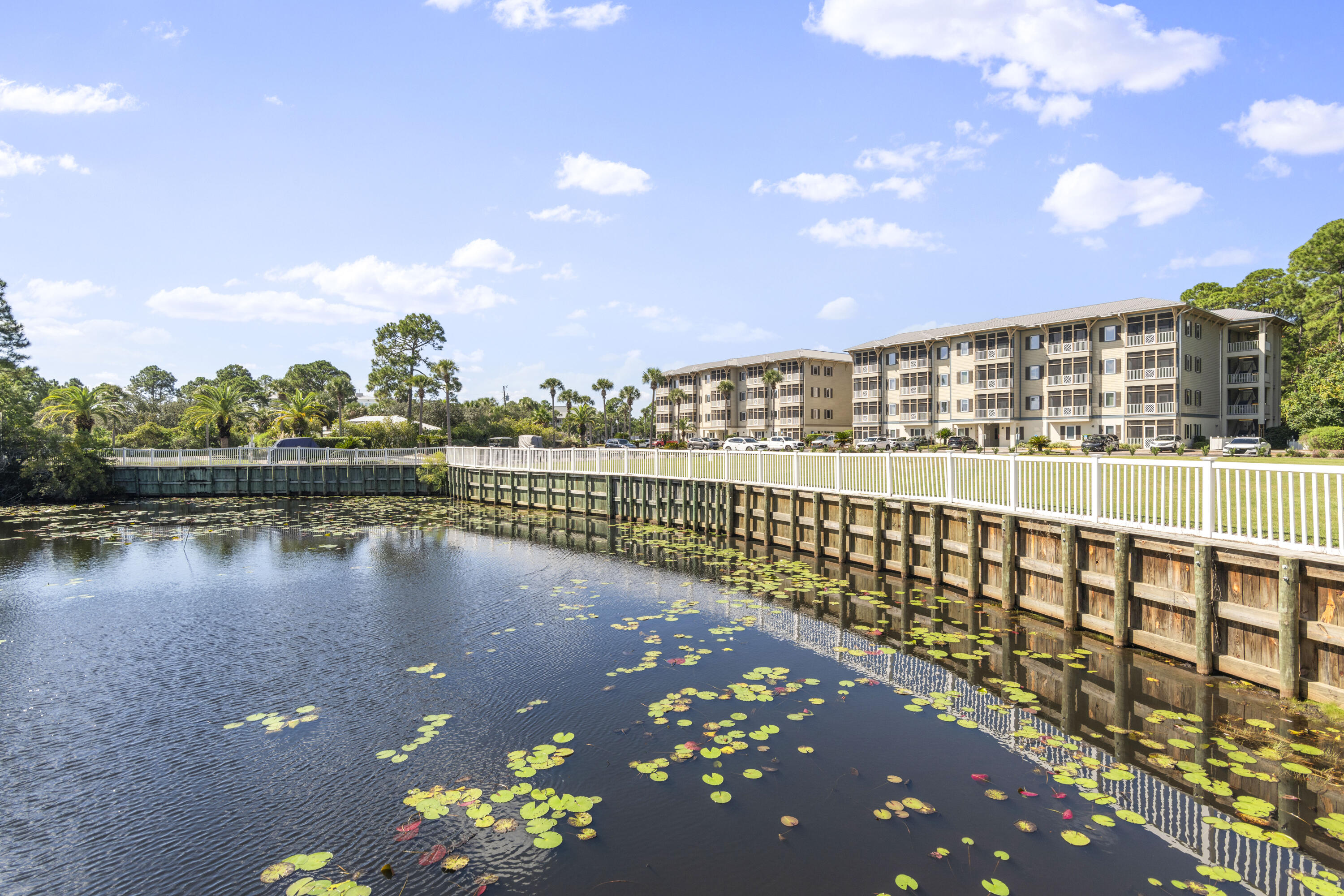 231 Somerset Bridge Road, Unit 2404 Santa Rosa Beach, FL 32459 - Photo 28 of 32 a view of a lake with a city