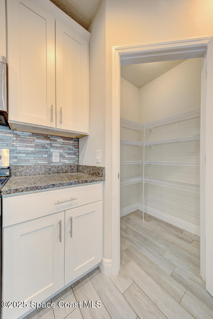 531 Topeka Road Southwest Palm Bay, FL 32908 - Photo 17 of 49 kitchen with pantry