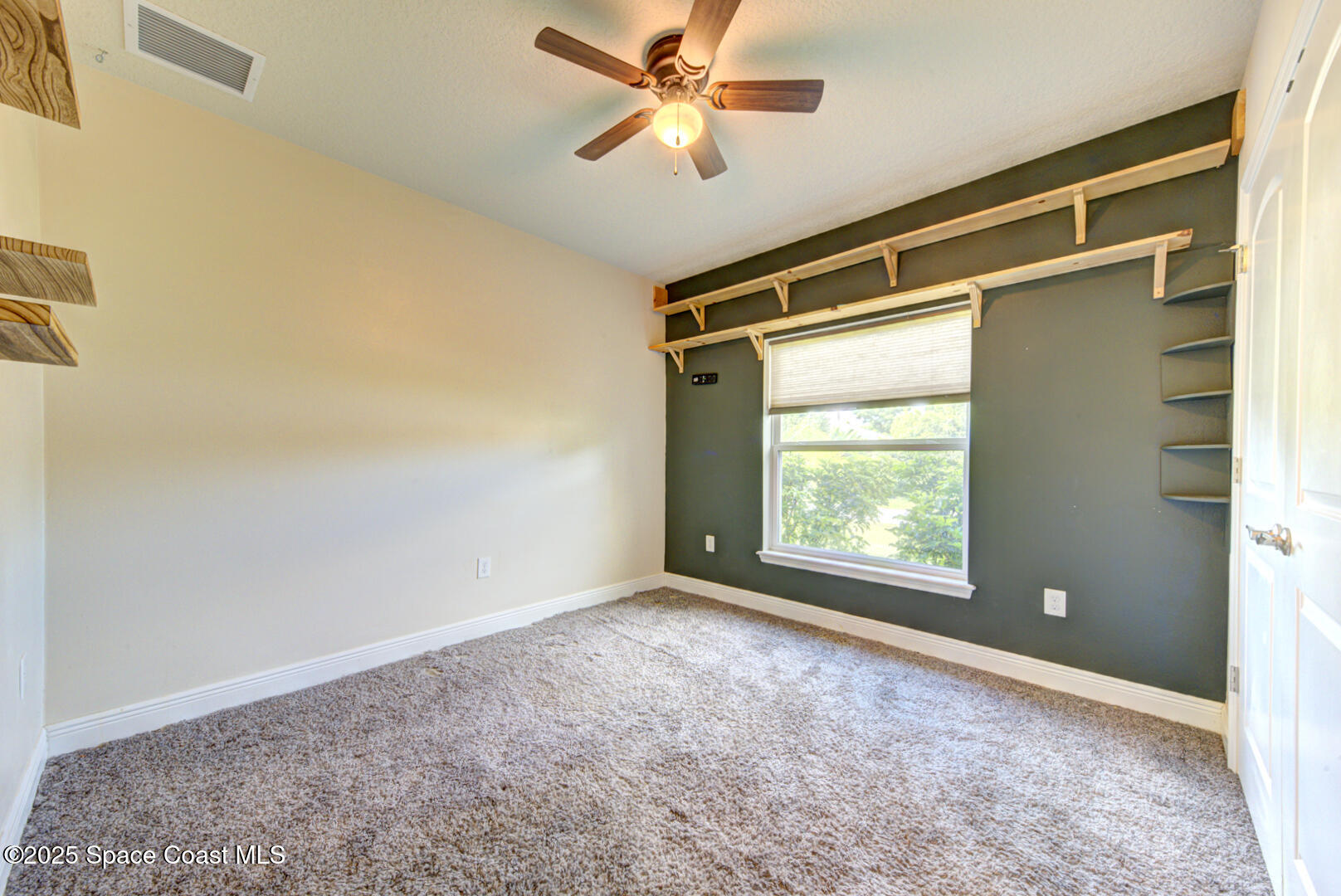 531 Topeka Road Southwest Palm Bay, FL 32908 - Photo 8 of 49 bedroom 2 view from door