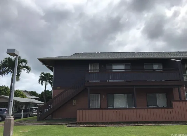 a view of house with yard