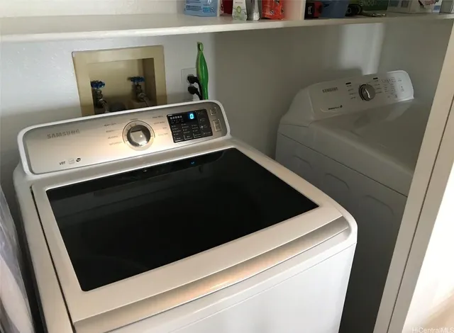 a utility room with dryer and washer