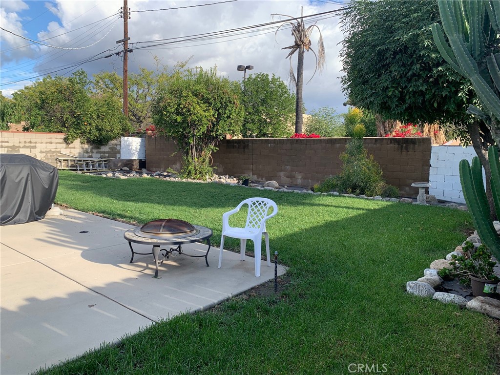 13232 Desmond Street Pacoima, CA 91331 - Photo 13 of 15 a view of a backyard with sitting area furniture and garden