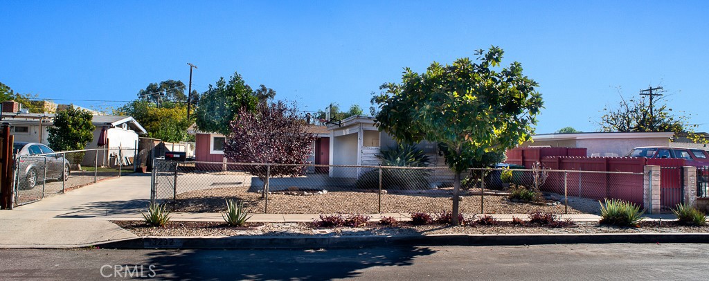13232 Desmond Street Pacoima, CA 91331 - Photo 15 of 15 a view of a fountain with potted plants