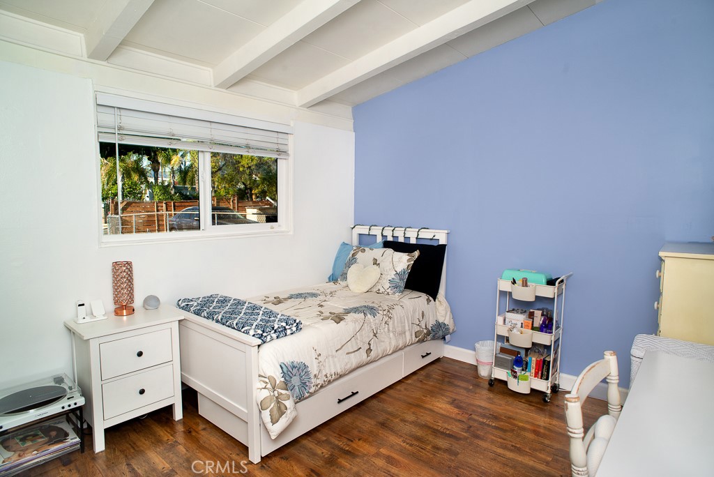 13232 Desmond Street Pacoima, CA 91331 - Photo 8 of 15 a bed room with a bed and a window