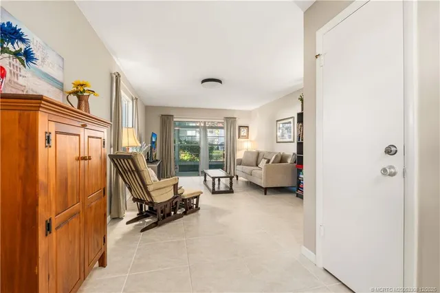 a view of a livingroom with furniture and windows