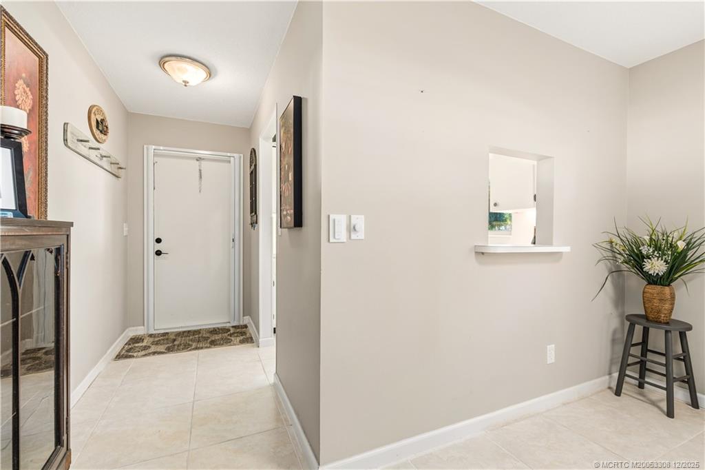 2600 Southeast Ocean Boulevard, Unit F7 Stuart, FL 34996 - Photo 18 of 54 a view of a room that has a bench in it