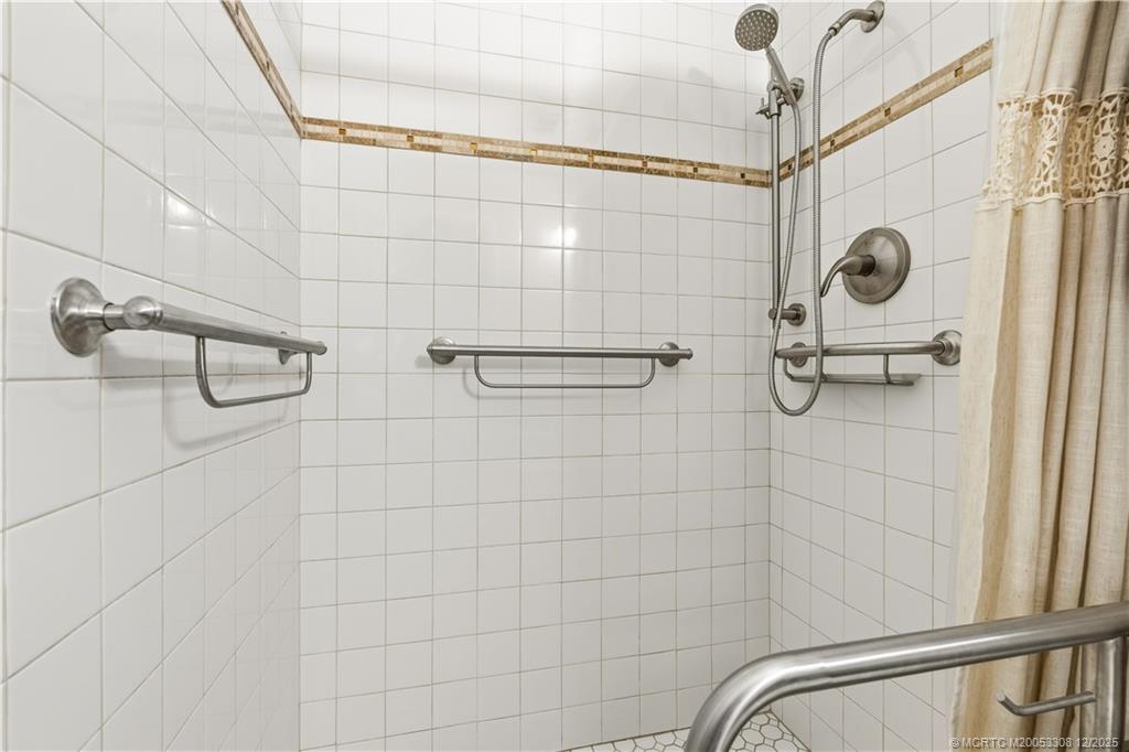 2600 Southeast Ocean Boulevard, Unit F7 Stuart, FL 34996 - Photo 23 of 54 a bathroom with a shower