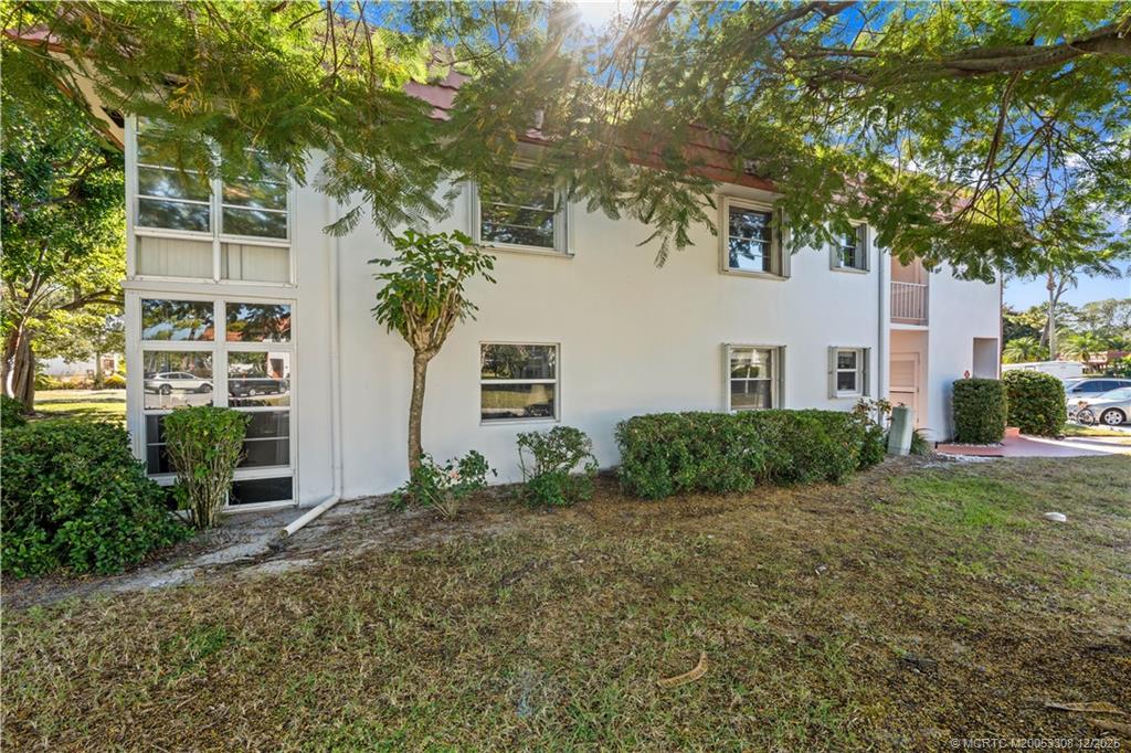 2600 Southeast Ocean Boulevard, Unit F7 Stuart, FL 34996 - Photo 36 of 54 a view of outdoor space and yard