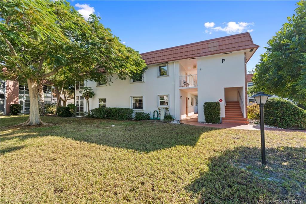 2600 Southeast Ocean Boulevard, Unit F7 Stuart, FL 34996 - Photo 37 of 54 a view of a house with a yard