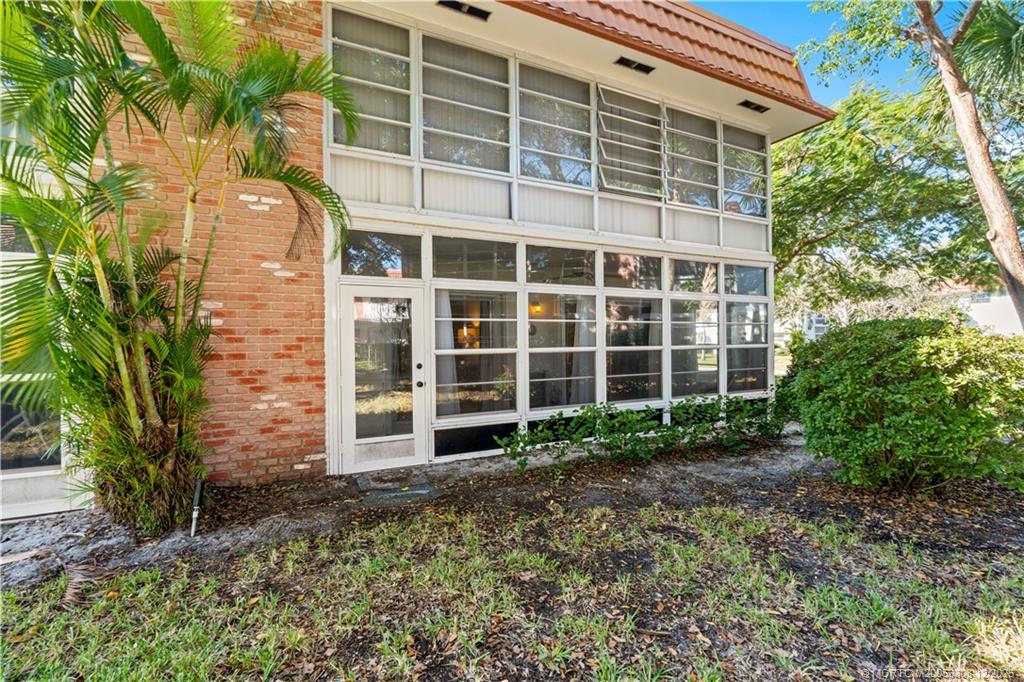 2600 Southeast Ocean Boulevard, Unit F7 Stuart, FL 34996 - Photo 38 of 54 a view of front door and yard