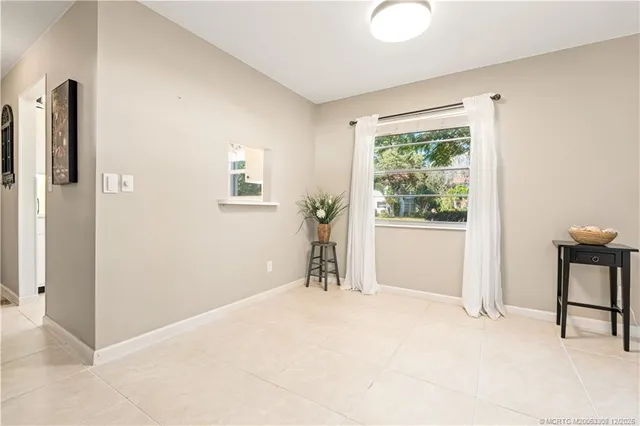 a view of livingroom with furniture and window
