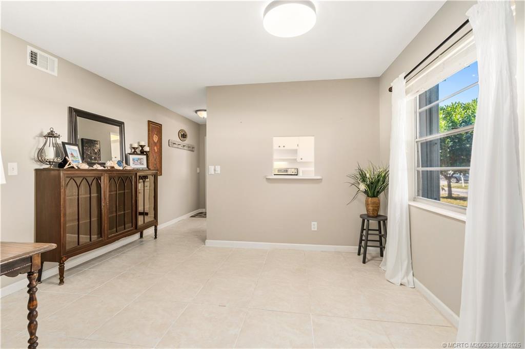 2600 Southeast Ocean Boulevard, Unit F7 Stuart, FL 34996 - Photo 9 of 54 a view of a livingroom with furniture and windows