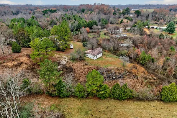 a view of a lot of trees and houses