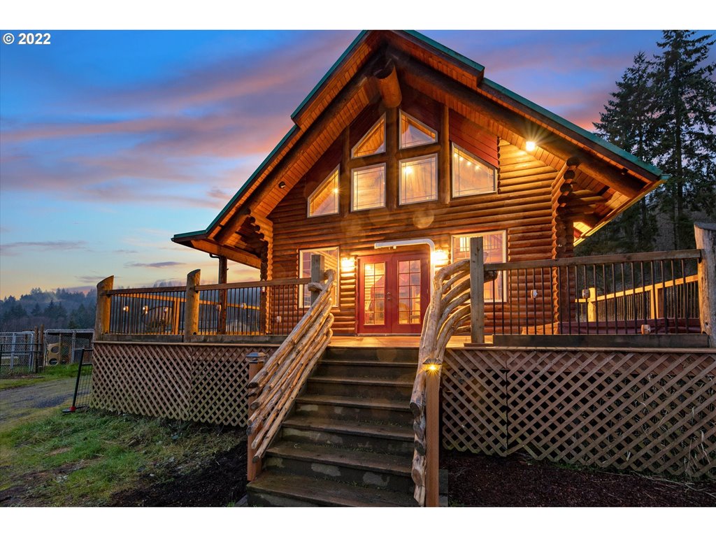 29134 Old Rainier Road Rainier, OR 97048 - Photo 1 of 30 a view of a house with a wooden deck