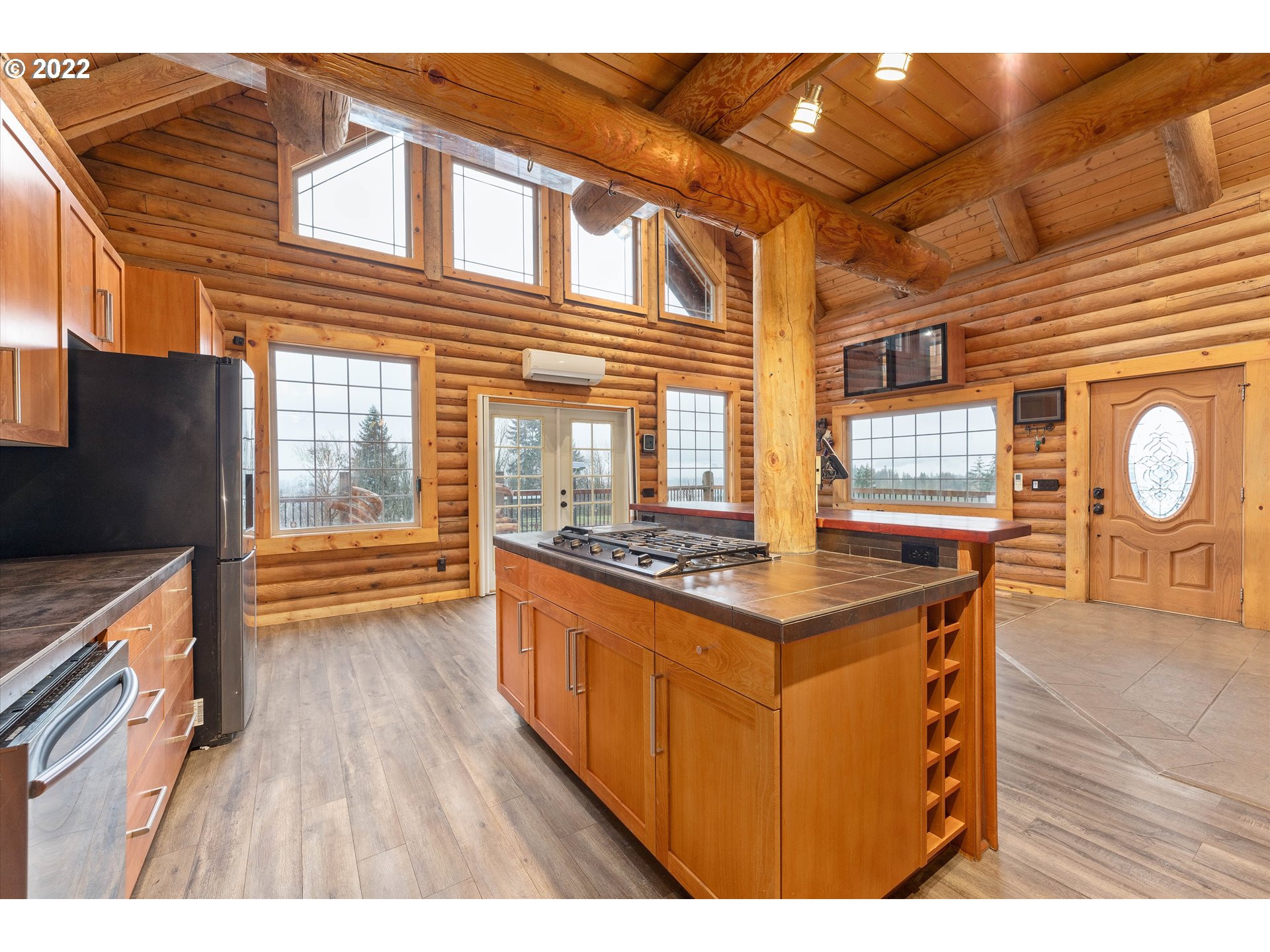 29134 Old Rainier Road Rainier, OR 97048 - Photo 5 of 30 a open kitchen with stainless steel appliances granite countertop a stove and a wooden floors