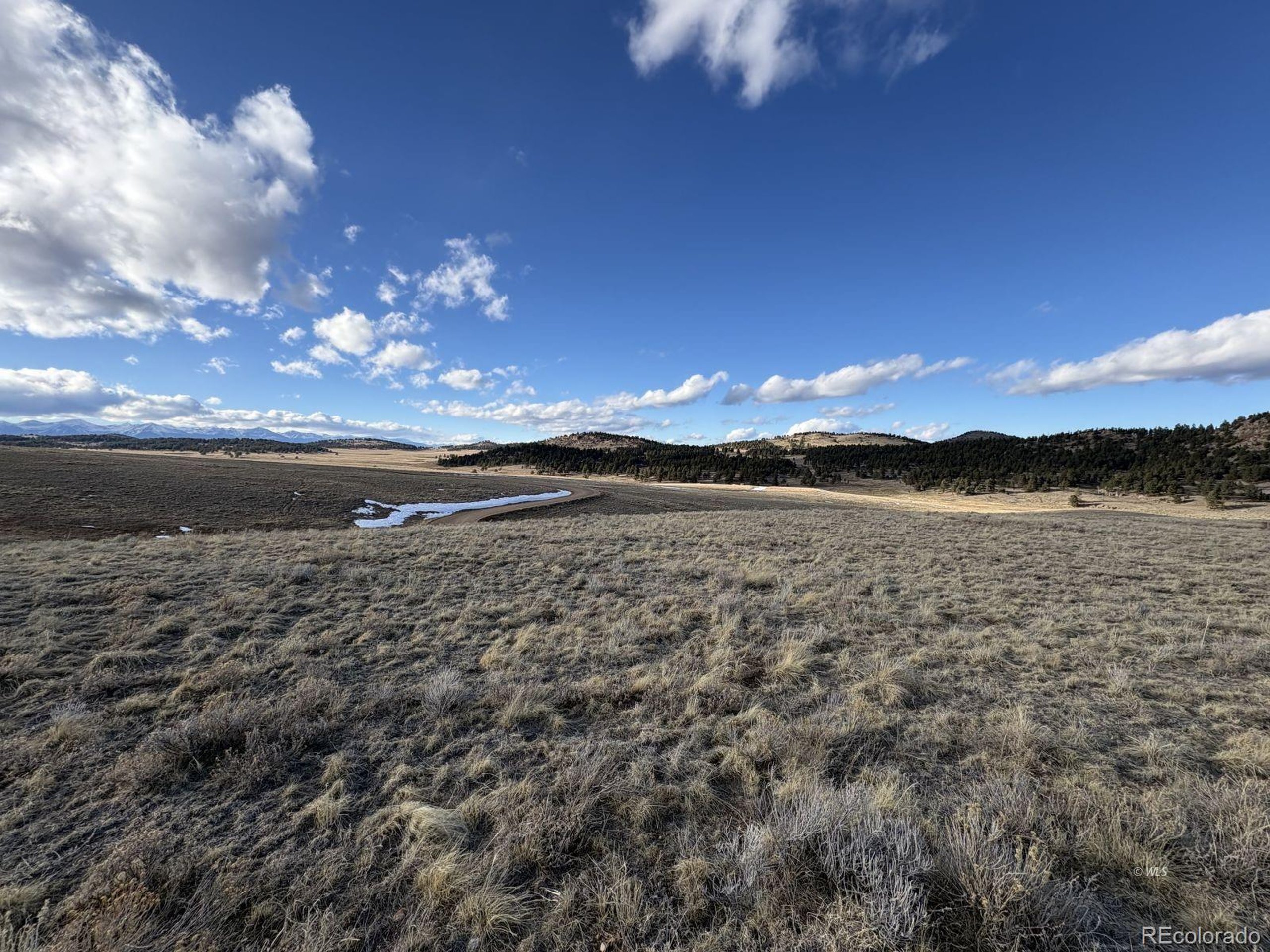 29 Eagle Springs Road Westcliffe, CO 81252 - Photo 8 of 17 a view of lake with sunset in background