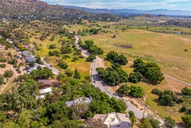 a view of an ocean and a mountain