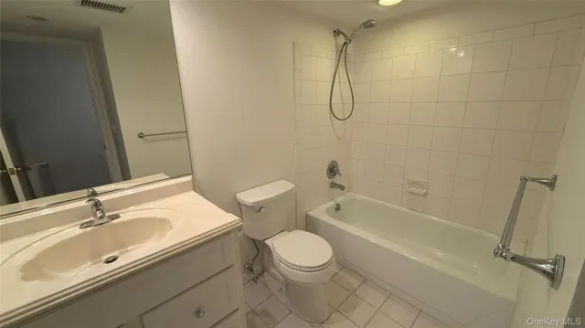 a bathroom with a sink a toilet and a bathtub