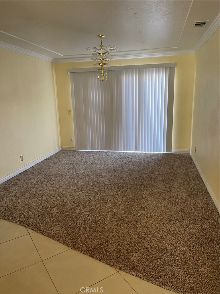 9279 Middlefield Drive Riverside, CA 92508 - Photo 13 of 26 a view of a room with a ceiling fan