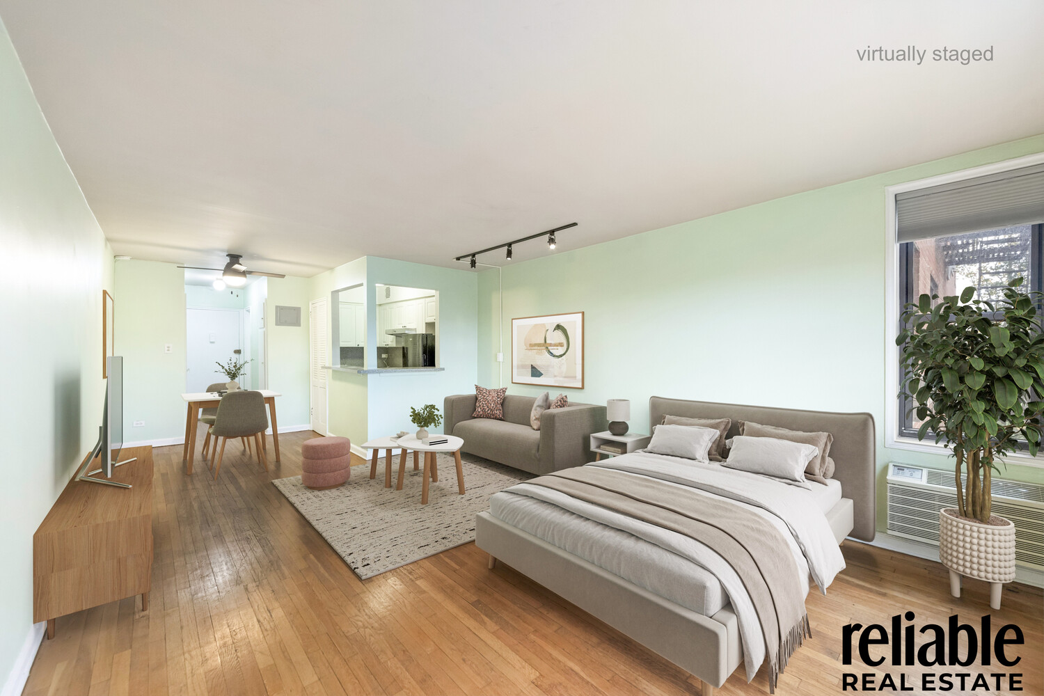 5235 Post Road, Unit 3H Bronx, NY 10471 - Photo 2 of 10 a bedroom with a bed and wooden floor