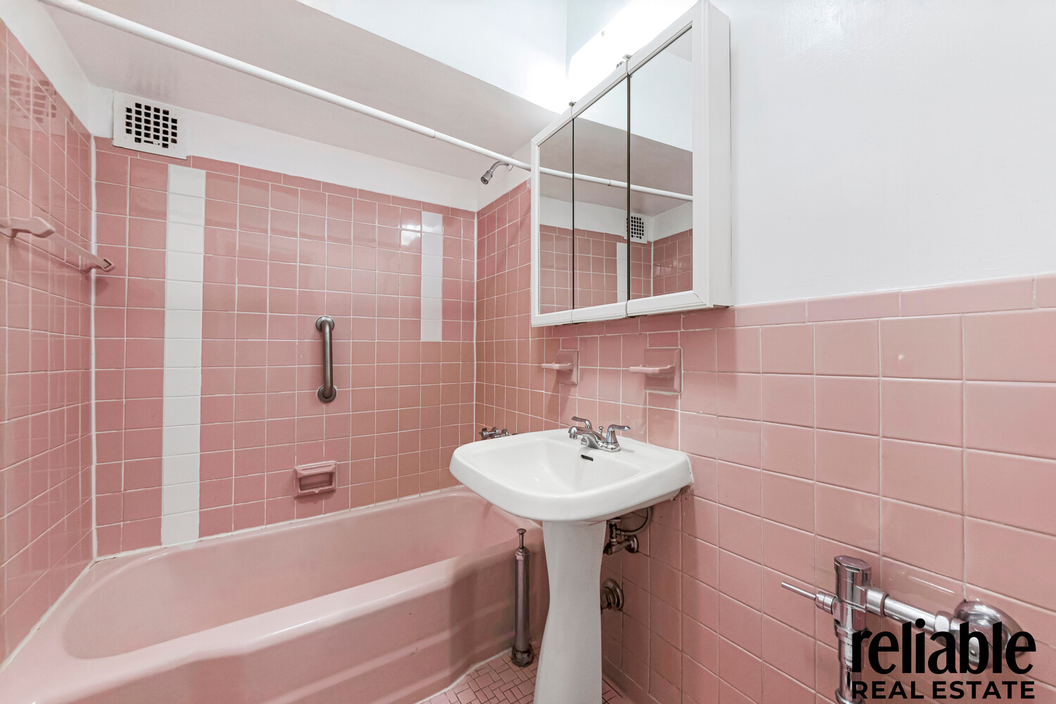 5235 Post Road, Unit 3H Bronx, NY 10471 - Photo 6 of 10 a bathroom with a sink shower
