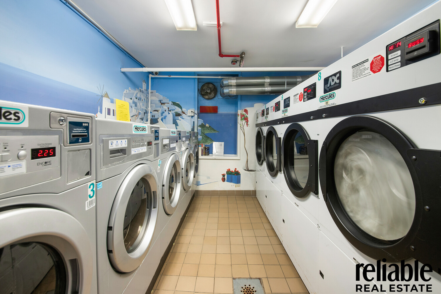 5235 Post Road, Unit 3H Bronx, NY 10471 - Photo 7 of 10 a utility room with dryer and washer